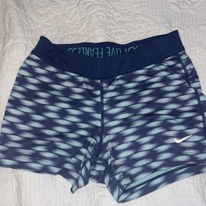 Purple and blue Nike spandex